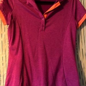 Nike Golf Shirt Med. Has logo of golf course on sleeve.
